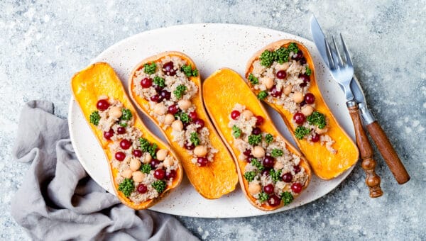 Stuffed butternut squash with chickpeas, cranberries, quinoa cooked in nutmeg, cloves, cinnamon